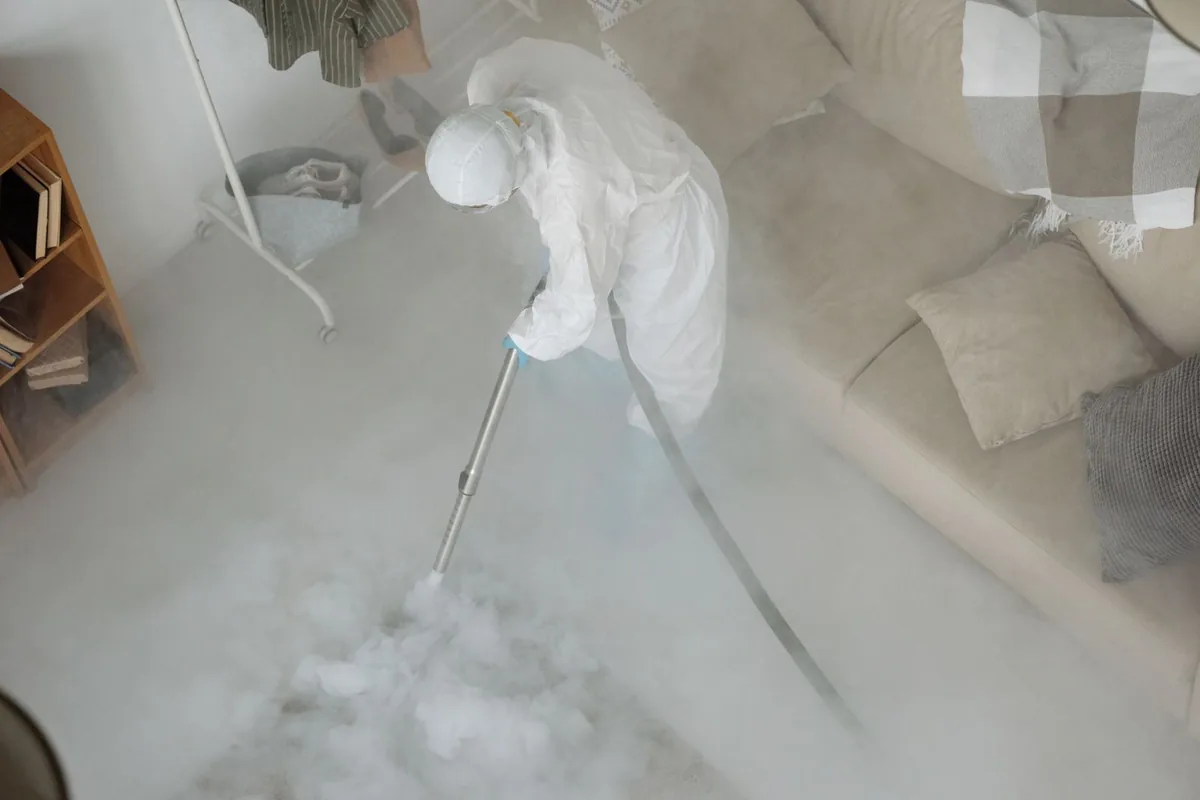 Biohazard cleanup technician in protective equipment, Brookdale, SC